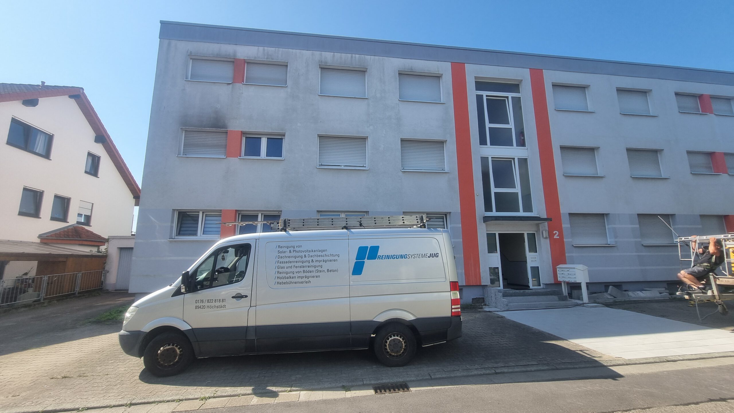 Verschmutzte Hausfassade